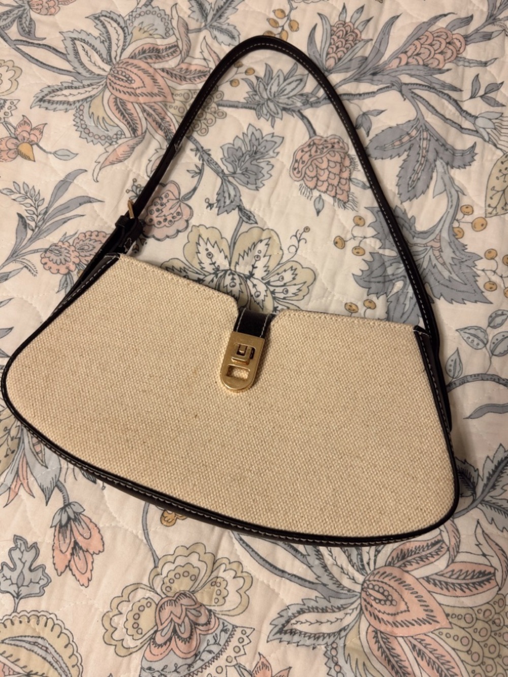 Cream Canvas Shoulder Bag with Black Trim and Gold Clasp